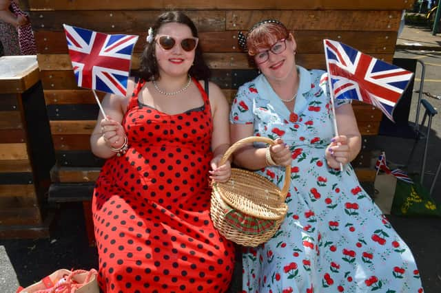 Flying the flag are (from left) Victoria Pacey and Sarah Pacey.