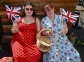 Flying the flag are (from left) Victoria Pacey and Sarah Pacey.