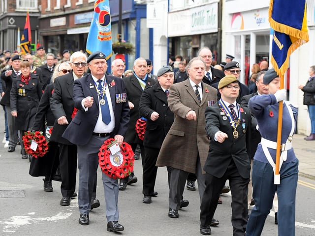 Armed Forces veterans march through Horncastle. Photo: Thomas Hooley
