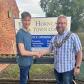 New Horncastle Town Councillor Owen Wilkinson, 18, with his dad and chairman Coun Matt Wilkinson.