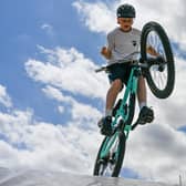 Launching from the ramp onto the jump bag. Photo: Richard Howes Photography