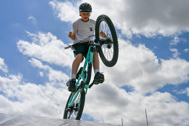 Launching from the ramp onto the jump bag. Photo: Richard Howes Photography