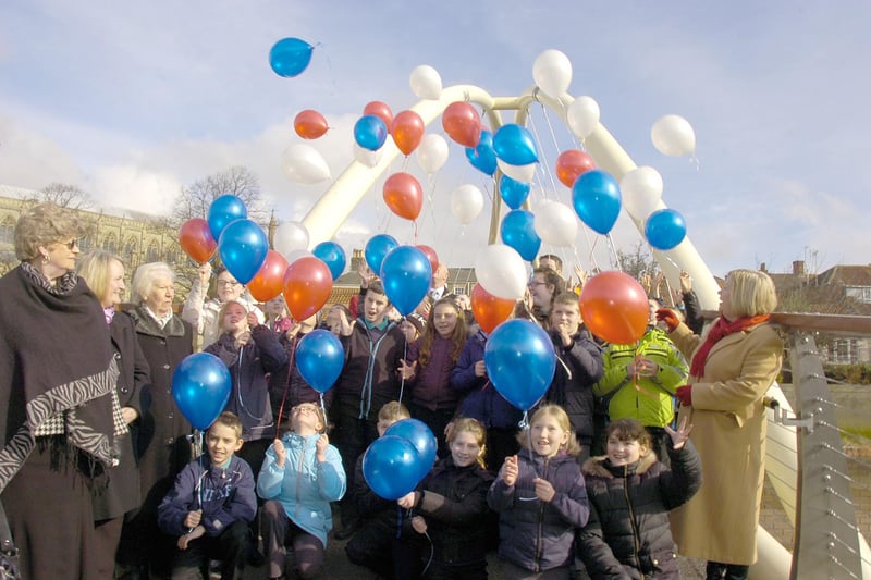 Pupils from Park Academy, in Boston, helping mark the official opening of the town's new St Botolph's Footbridge. The new structure was much wider than its predecessor, and also had a non-slip surface. The £750,000 cost was shared by Lincolnshire County Council and the European Regional Development Fund.