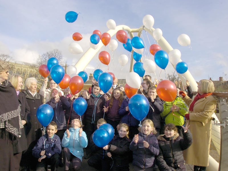Pupils from Park Academy, in Boston, helping mark the official opening of the town's new St Botolph's Footbridge. The new structure was much wider than its predecessor, and also had a non-slip surface. The £750,000 cost was shared by Lincolnshire County Council and the European Regional Development Fund.