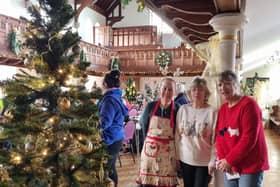 Volunteers at Wainfleet Methodist Church ready to welcome members of the public to this weekend's Christmas tree festival.