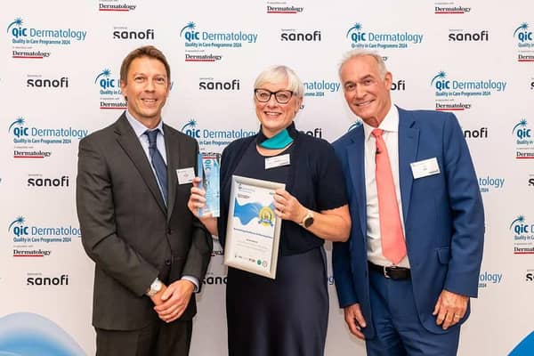 Nicola receiving her award from Dr Hilary Jones and Steve Symonds from sponsors Sanofi