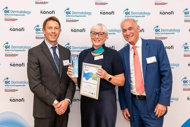 Nicola receiving her award from Dr Hilary Jones and Steve Symonds from sponsors Sanofi
