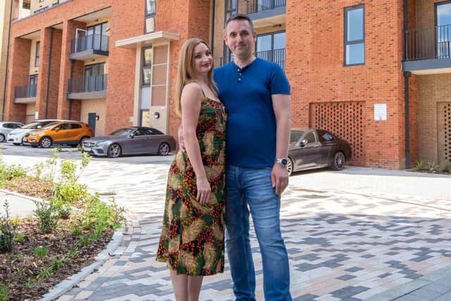 Sebastian and Joanna outside where they live at Bellway’s Copperhouse Green in Dartford