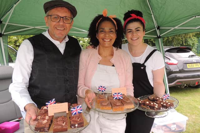 John and Alison Cole with Christina Gould of Crispy's Cakes and Bakes, from Sleaford, had a stall at the 1940s Day.