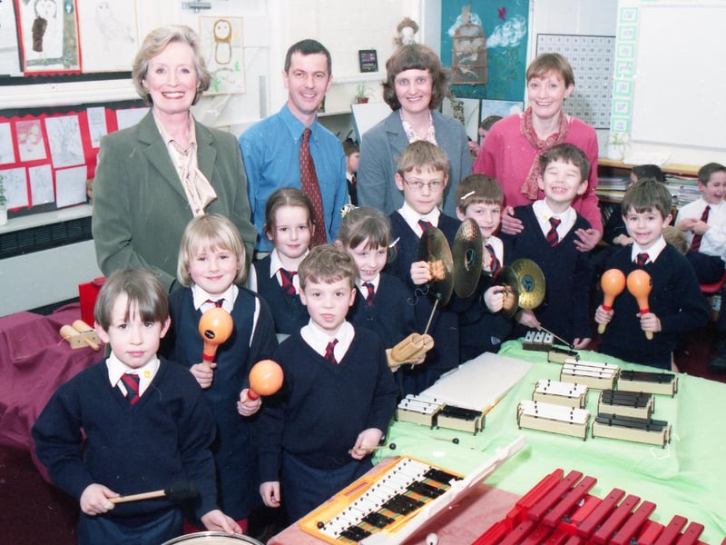 Bicker Preparatory School receiving more than £1,000 worth of percussion instruments, including a glockenspiel for each pupil. The donation was made by Chairman of the Parents Association Charles Campion. Also pictured are pupils, headteacher Sheila Page and teachers Wendy Bell and Beverley Duerden.