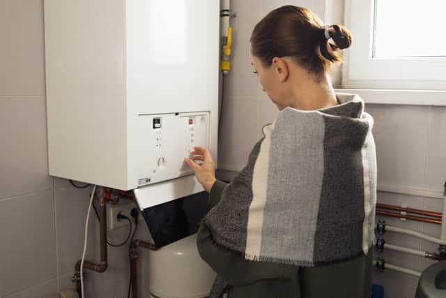 Neutral adult woman with boiler