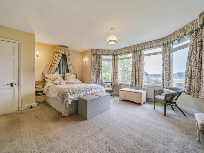 One of the six bedrooms.