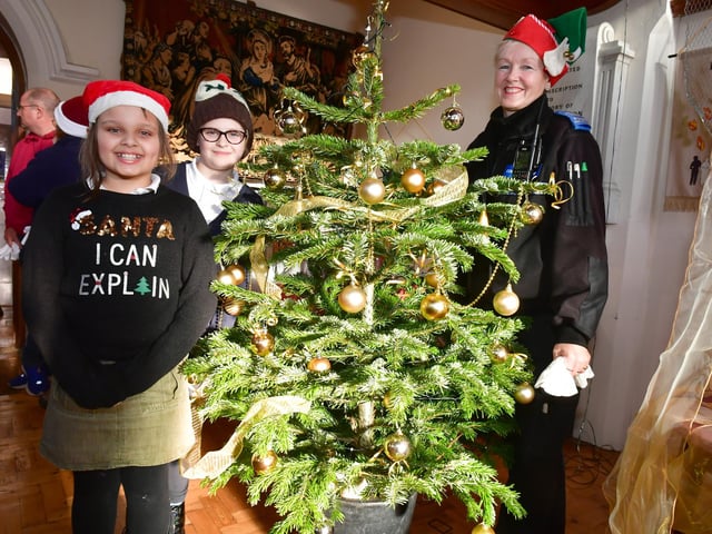 Tree-mendous effort - Mini Police Tillie Ongley 9, Macey Smith 10, and PCSO Jayne Richardson.