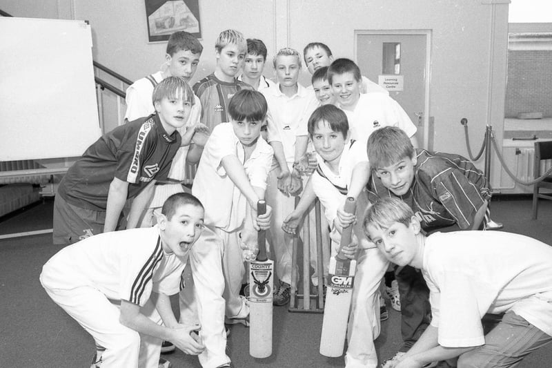 Pupils at Kirton Middlecott School posing for the camera following a cricket coaching session with Lincolnshire captain Mark Fell and former Nottinghamshire skipper Paul Johnson.