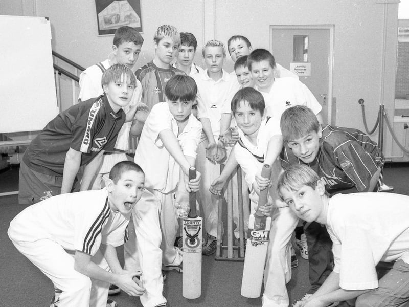 Pupils at Kirton Middlecott School posing for the camera following a cricket coaching session with Lincolnshire captain Mark Fell and former Nottinghamshire skipper Paul Johnson.