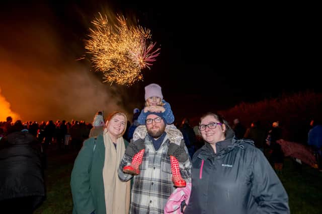 Enjoying Horncastle's fireworks, from left: Kate Woods, Dave Whitaker, Frankie Crow, and Amelia Weston, 5. Photos: John Aron Photography