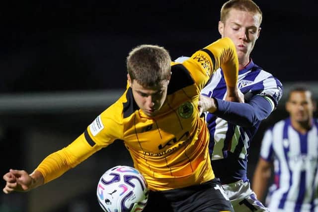 Boston and West Brom battle for the ball last night. Photo by Chris Bray.