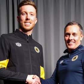 Boston keeper Louis Chadwick with manager Paul Hurst.