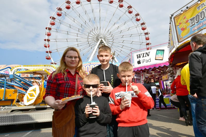 Enjoying some refreshments are: Ewelina Golko with Alex Golko, 6, Tomek Golko, 12 and Mateusz Golko, 8.