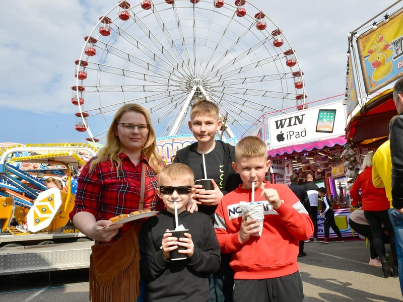 Enjoying some refreshments are: Ewelina Golko with Alex Golko, 6, Tomek Golko, 12 and Mateusz Golko, 8.