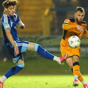 Halifax try to cut out a Georgie Gent cross on Tuesday night.