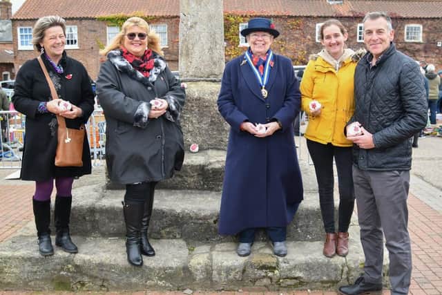Poppy rocks were layed at the Buttercross in Wainfleet.