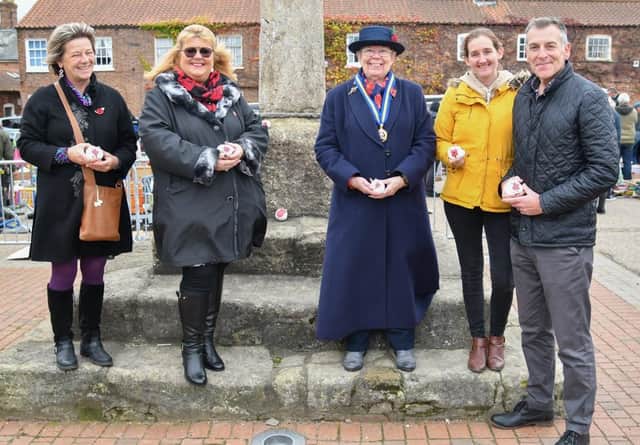Poppy rocks were layed at the Buttercross in Wainfleet.