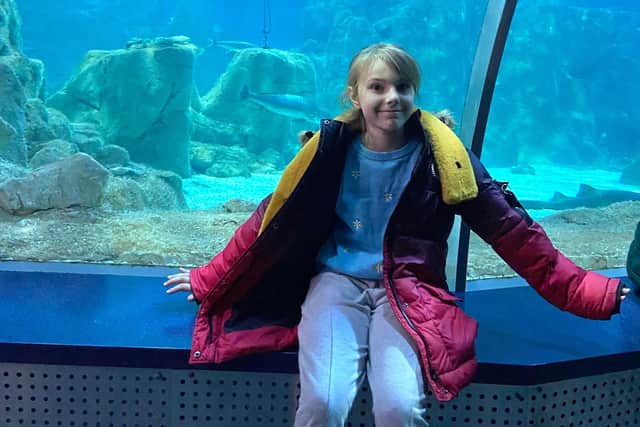 Lilia Valutyte pictured at a public aquarium.