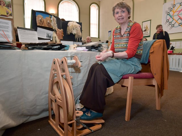 Lyn Quigley of Louth, promoting the Spinners, Weavers and Dyers Guild, in Louth Methodist Church. Photo: David Dawson