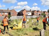 Volunteers clearing St Clements Churchyard in Skegness. Photo: Barry Robinson.