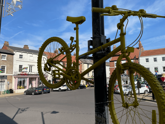 One of the spray painted yellow recycled bikes in Caistor. Photo: WDLC