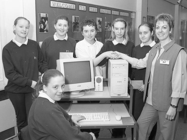 Pupils at Boston's Haven High receiving a new computer for the school from Asda's Gail Priestley. The school had teamed up with the town's Asda store for the chance to win the equipment through the Big Sum competition. Pictured with Gail are Freddie Jewell, Natalie Hudson, Vicki Poelstra, Kerri Taylor, Charlotte Toyer and Lisa Harker.