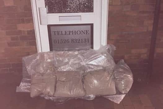 The sandbags and plastic sheeting kept the flood waters at bay at Hare and Beauty's salon in Ruskington overnight.