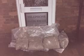 The sandbags and plastic sheeting kept the flood waters at bay at Hare and Beauty's salon in Ruskington overnight.