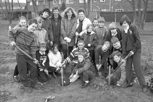 A tree-planting session at Boston's St Nicholas School in early 1994. The pupils, together with staff and parents, planted 200 trees on the school playing fields.