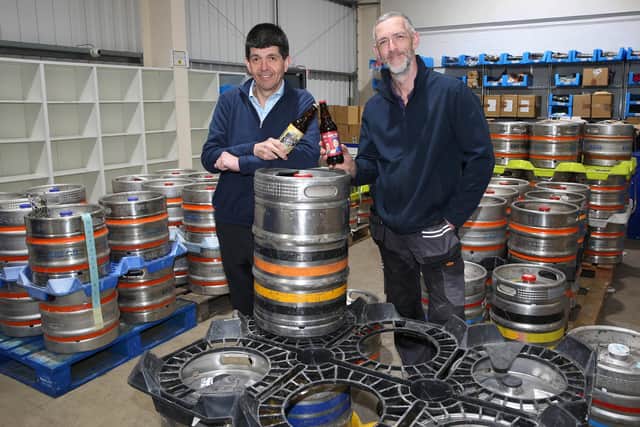 Paul Cooper and Adam Martin with some of the 400 gallons of cask ales.