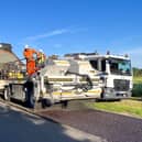 LCC Highways crews carrying out a road dressing.