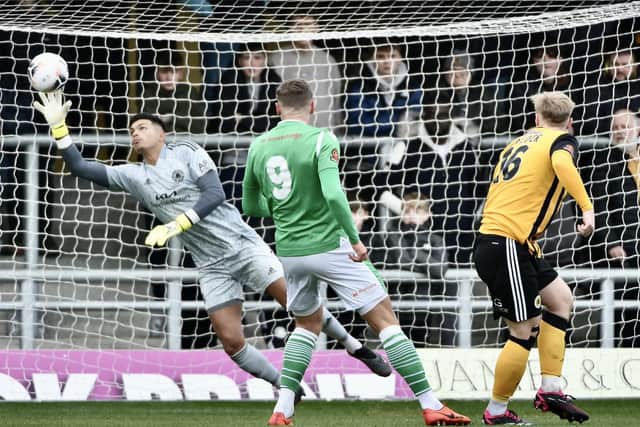 Cameron Gregory makes a top save.