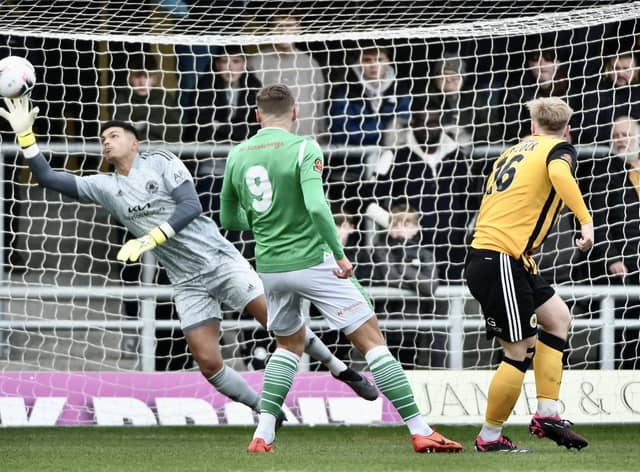 Cameron Gregory makes a top save.