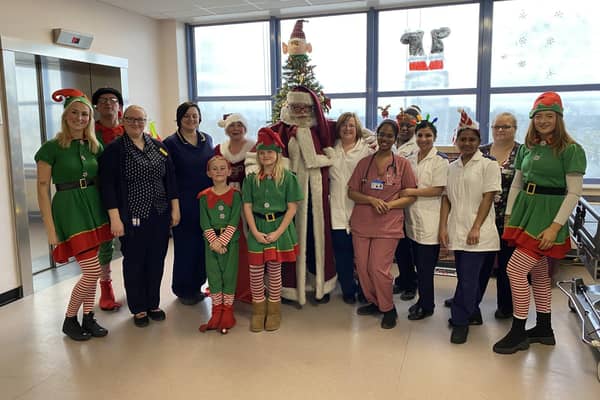 Santa, elves and staff at the children's wards at Pilgrim Hospital, Boston.Photo: ULHT