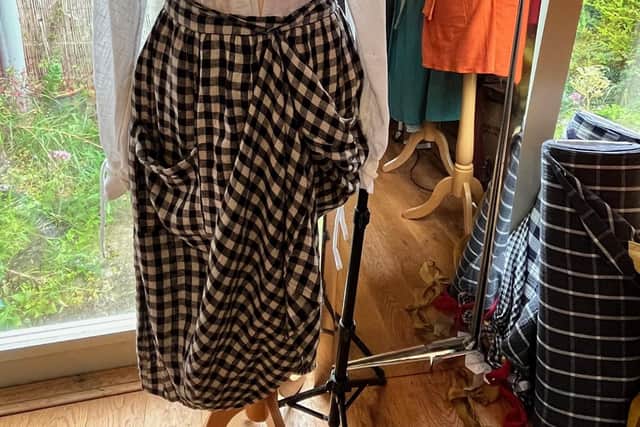 House of Flint's Century shirt with linen skirt.