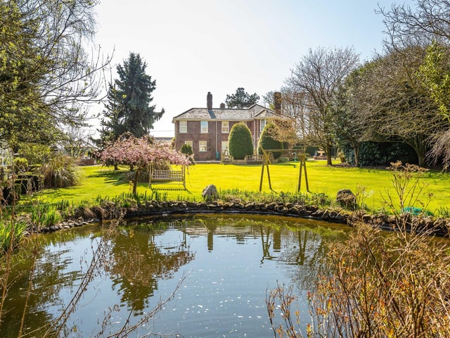Looking back at the home from the pond.