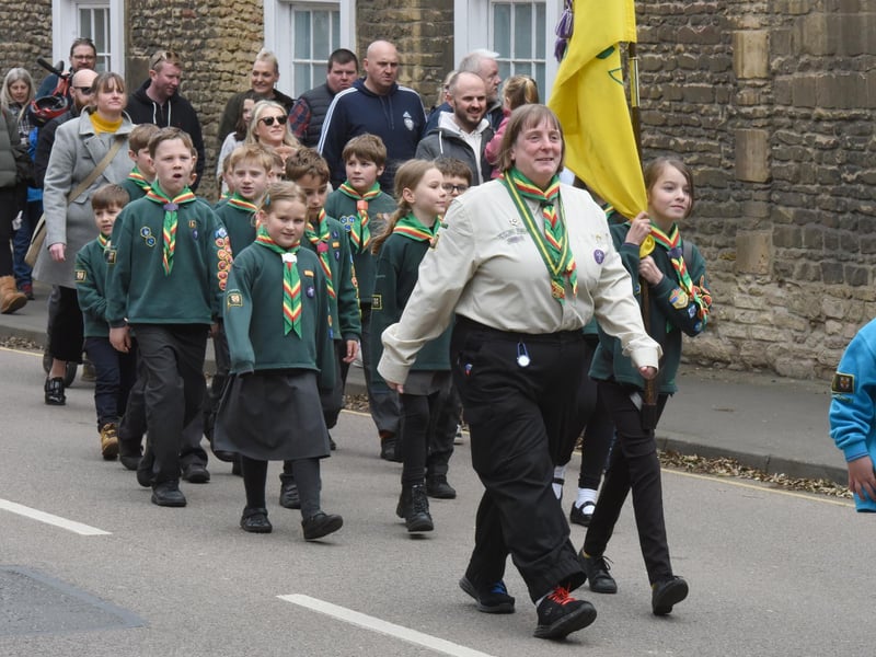 Sleaford Group Scout Leader Helen Zealand leads some of her troop down Eastgate in the St George's Day parade. Photo: David Dawson