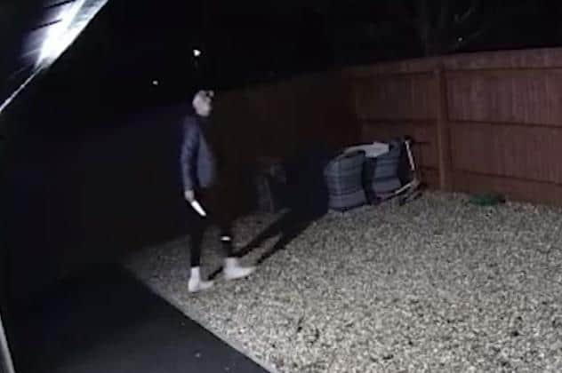 Lincolnshire Police have released this security camera footage of the man holding a knife.