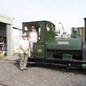 Pam and Roger Biggs on the footplate of the 1903 vintage steam locomotive Jurassic,. Photo: John Raby.
