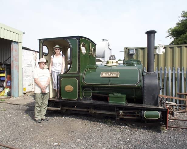 Pam and Roger Biggs on the footplate of the 1903 vintage steam locomotive Jurassic,. Photo: John Raby.