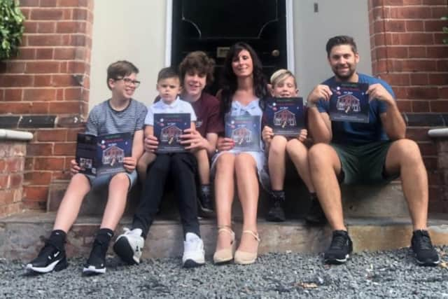 Ric, right, with Victoria, centre, with her three sons, from left, George, brother Harry holding Hugo, and Charlie.