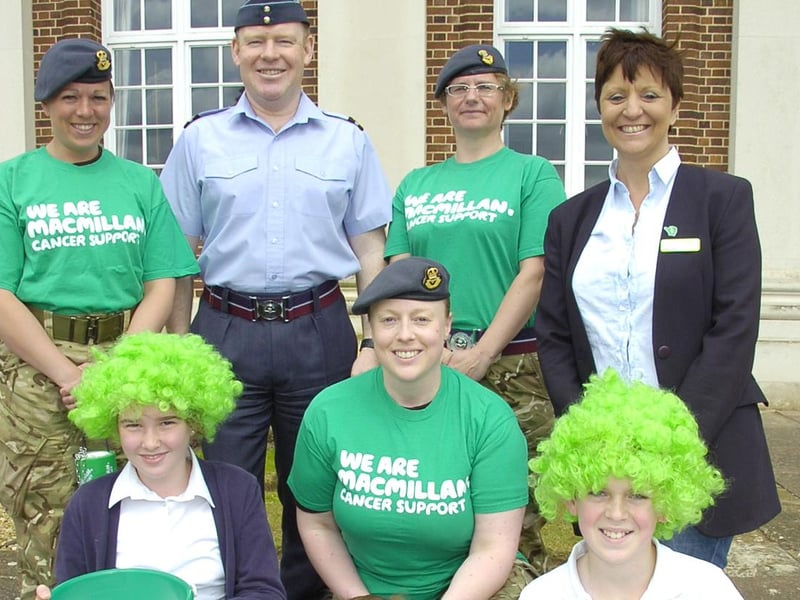 Pictured (from left, back) Charlie Gilbert, Air Commodore Stubbs, Michelle Sanderson, Tanya Taylor, Macmillan fund raising manager for Lincolnshire, (front), Ella Hansford, 11, Flt Lt Kate Marshall, and Joseph Enright, 11.