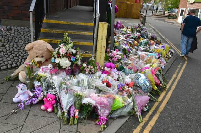 Floral tributes left at the scene in Fountain Lane.