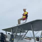 Doreen Buzzard wingwalking for LIVES.